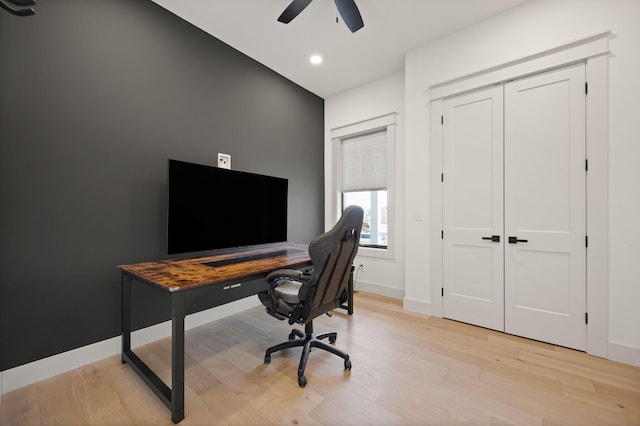 home office with light wood-style floors, recessed lighting, baseboards, and a ceiling fan