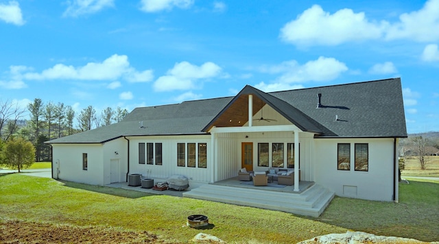 rear view of property with a yard, an outdoor hangout area, a ceiling fan, crawl space, and a wooden deck