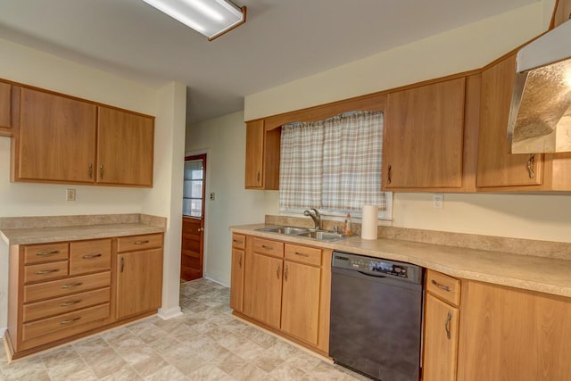 kitchen featuring light countertops, dishwasher, and a sink