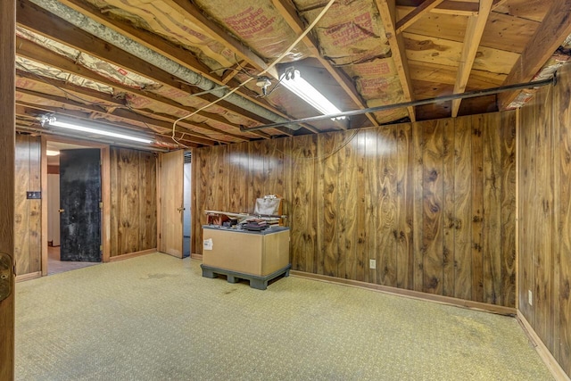 unfinished basement featuring wooden walls