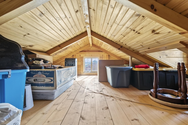 bonus room with wood ceiling, vaulted ceiling with beams, and hardwood / wood-style floors