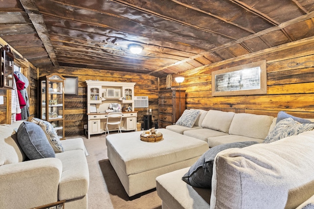 living area with a wall unit AC, carpet flooring, vaulted ceiling, wooden walls, and wooden ceiling