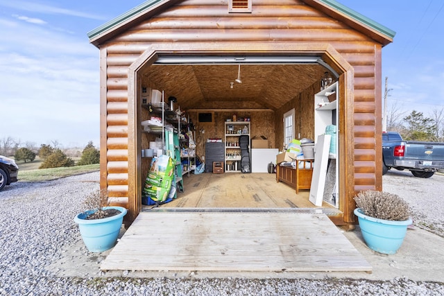 view of outbuilding featuring a garage