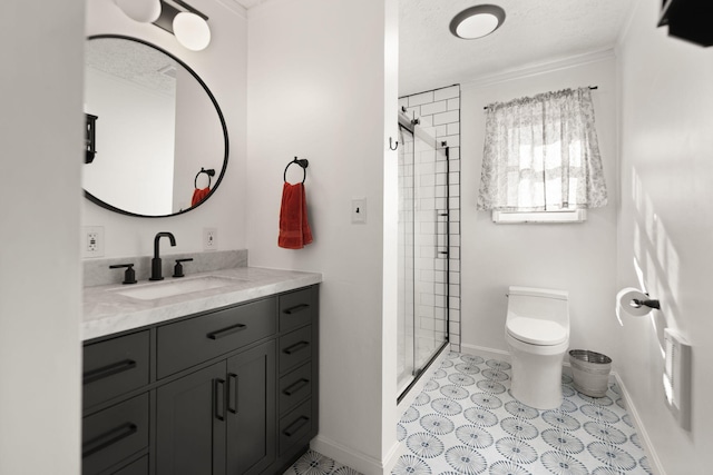 full bath with toilet, vanity, baseboards, tile patterned floors, and a stall shower