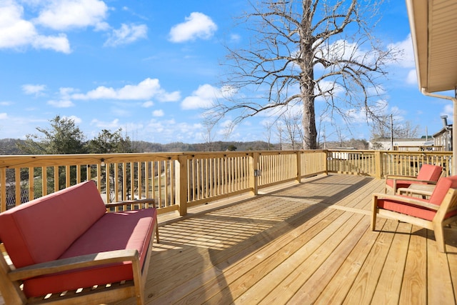 deck with an outdoor hangout area