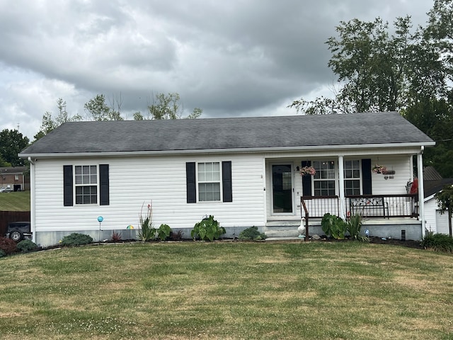 ranch-style house with a front lawn and a porch