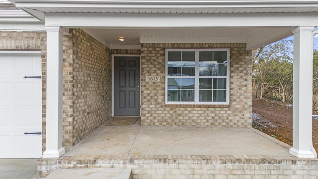 property entrance featuring a garage