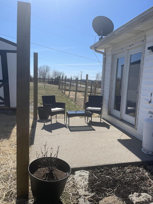 view of patio with fence