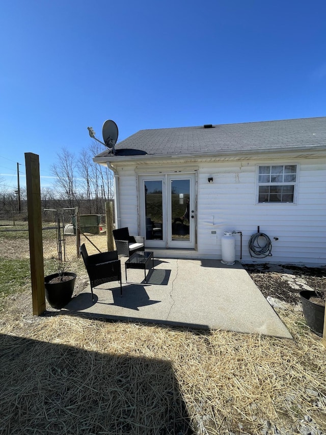 rear view of property with a patio area