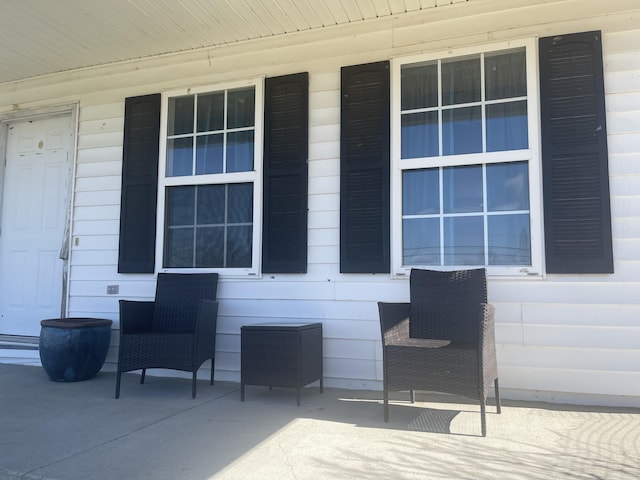 view of patio featuring a porch