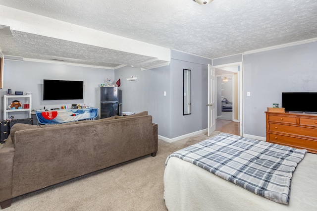 bedroom with baseboards, a textured ceiling, carpet, and ornamental molding