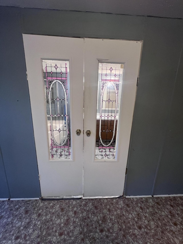 details featuring french doors and tile patterned floors