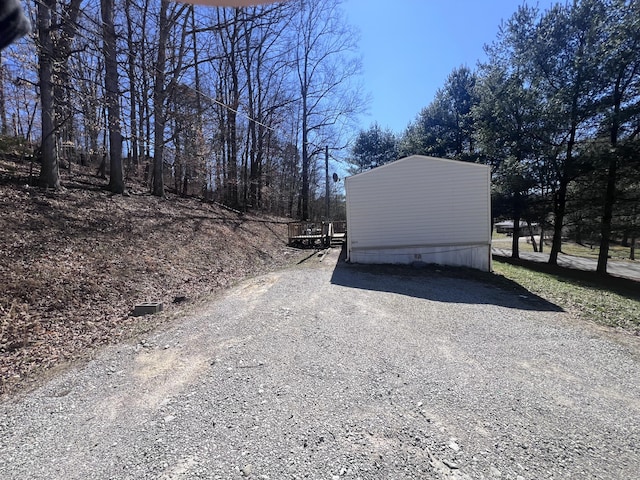 view of road with driveway