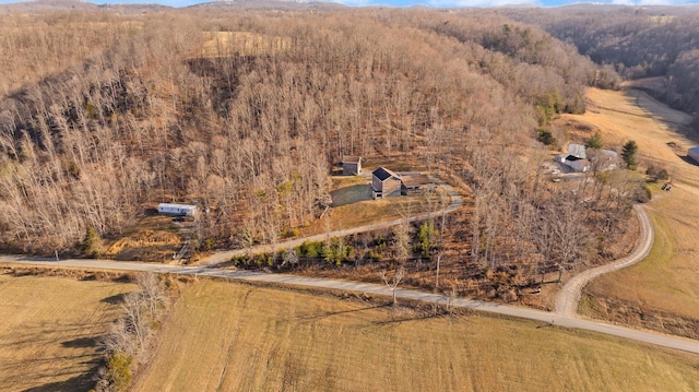 drone / aerial view with a view of trees