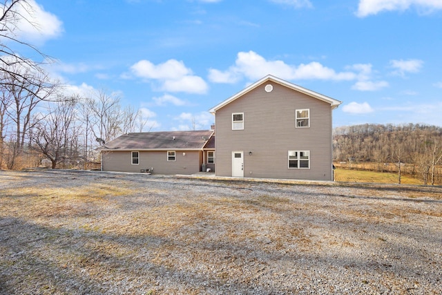 rear view of house featuring a patio