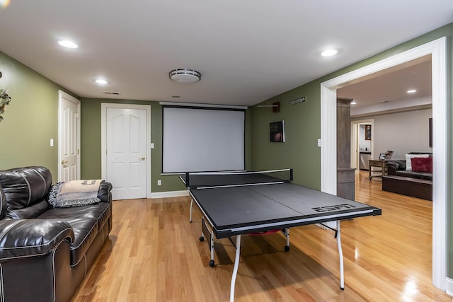 recreation room featuring recessed lighting, visible vents, and light wood finished floors