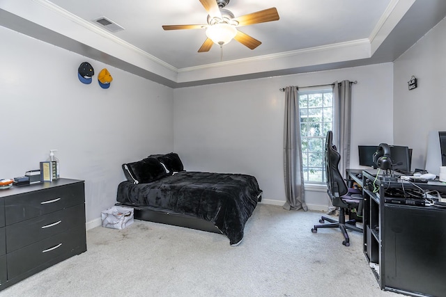 bedroom with baseboards, visible vents, crown molding, and light colored carpet