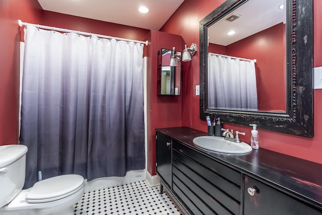 full bathroom with visible vents, toilet, tile patterned flooring, vanity, and recessed lighting