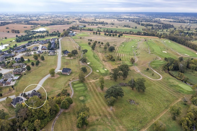 birds eye view of property featuring view of golf course