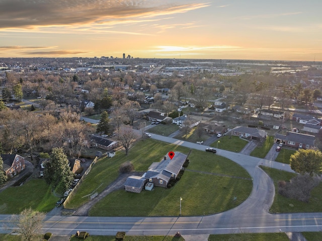 aerial view at dusk with a residential view