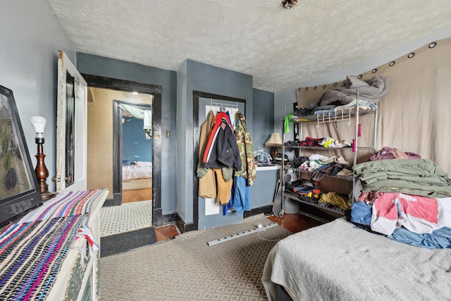 bedroom featuring a textured ceiling