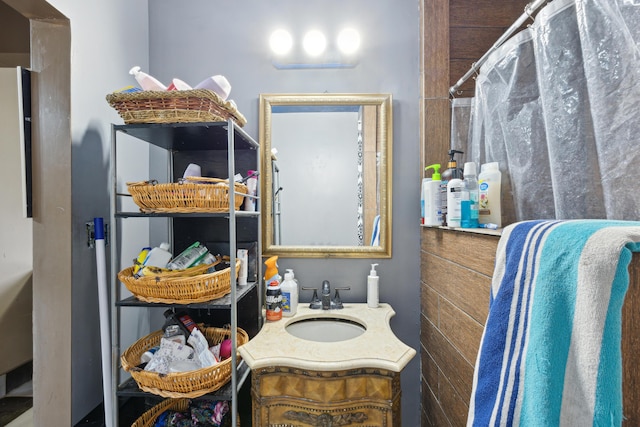 full bathroom with a shower with shower curtain and vanity