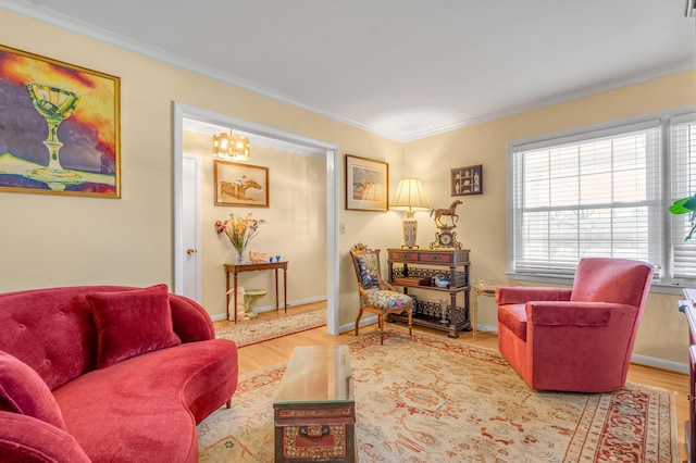 living room with baseboards, wood finished floors, and crown molding