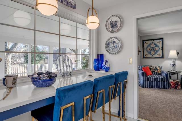 view of carpeted dining space