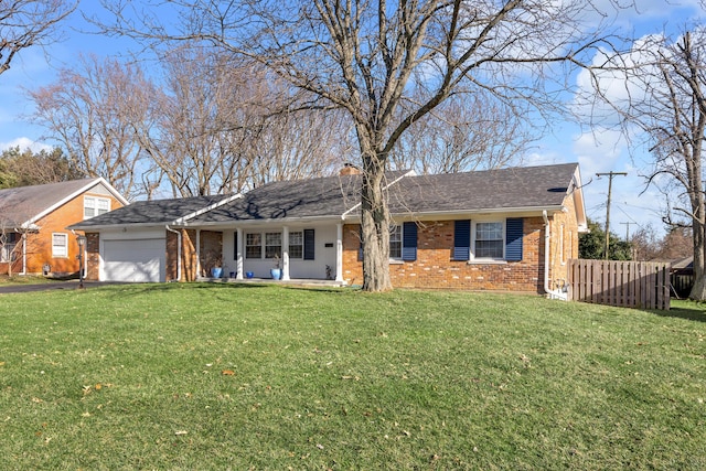 ranch-style home with brick siding, a chimney, an attached garage, fence, and a front lawn