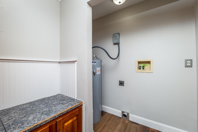 clothes washing area with hookup for a washing machine, hookup for an electric dryer, laundry area, wood finished floors, and water heater