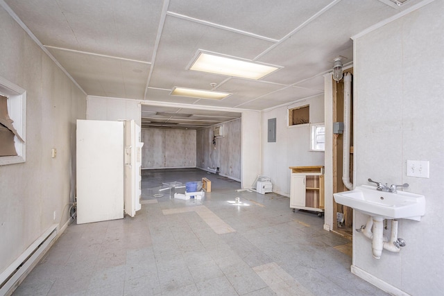 interior space featuring electric panel, baseboard heating, and tile patterned floors