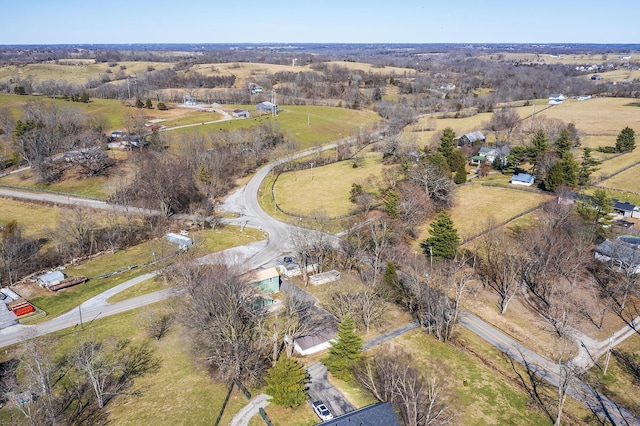 birds eye view of property featuring a rural view