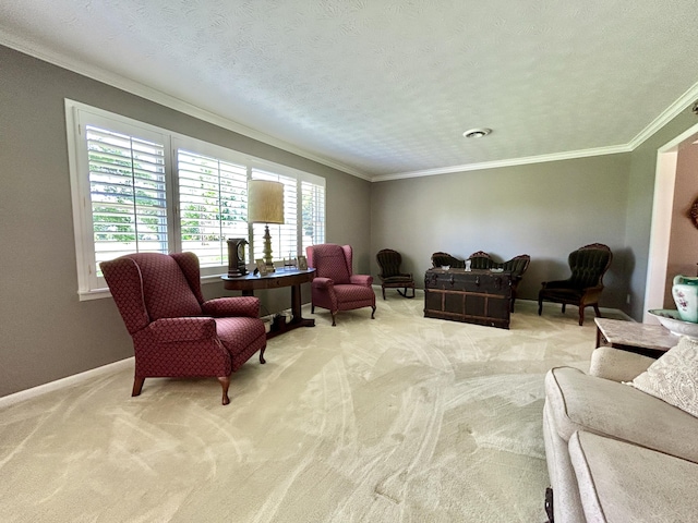 living area with light colored carpet, crown molding, a textured ceiling, and baseboards