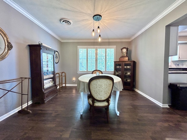 dining space featuring visible vents, dark wood finished floors, and baseboards