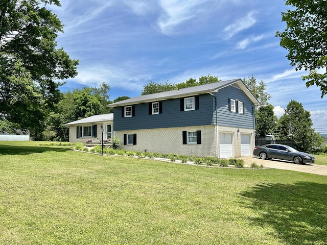 view of front facade featuring an attached garage, a front yard, concrete driveway, and brick siding