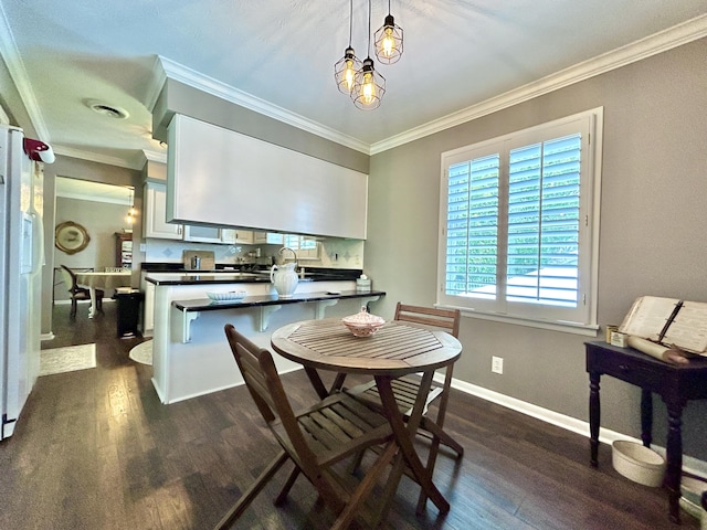 kitchen featuring tasteful backsplash, dark countertops, ornamental molding, dark wood-type flooring, and a peninsula