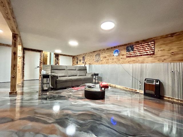 living room featuring concrete flooring and heating unit