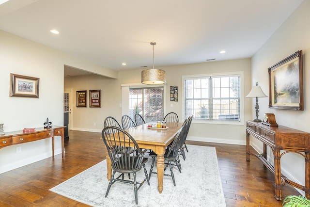 dining room featuring recessed lighting, baseboards, and wood finished floors