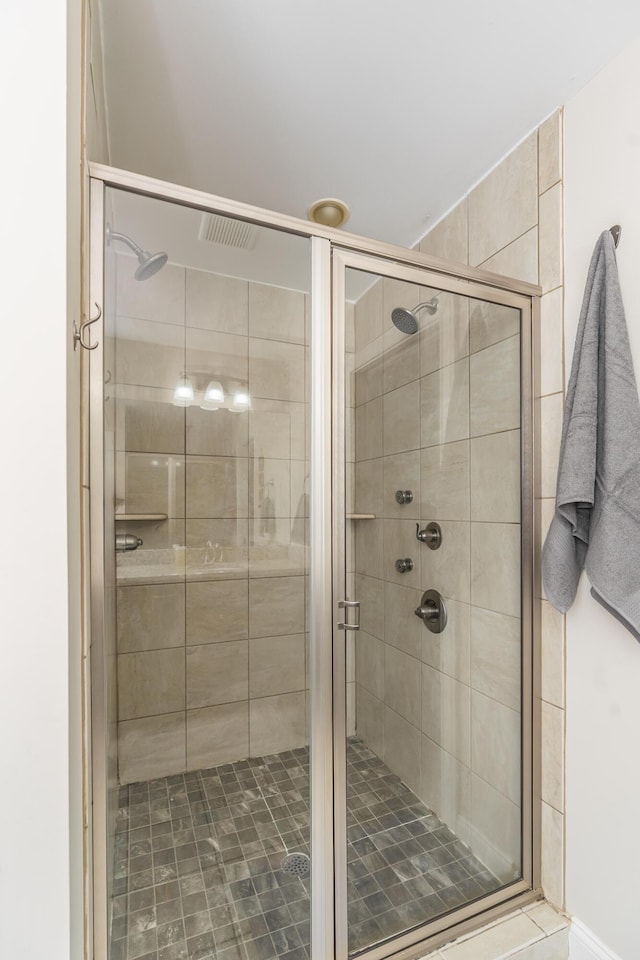 full bath featuring a stall shower