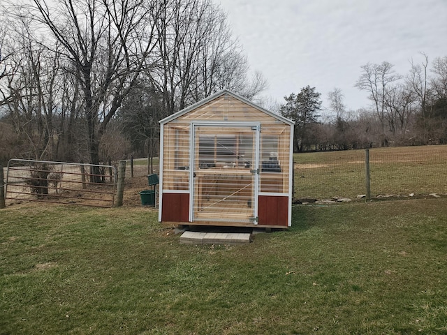 view of outdoor structure with an outdoor structure and fence