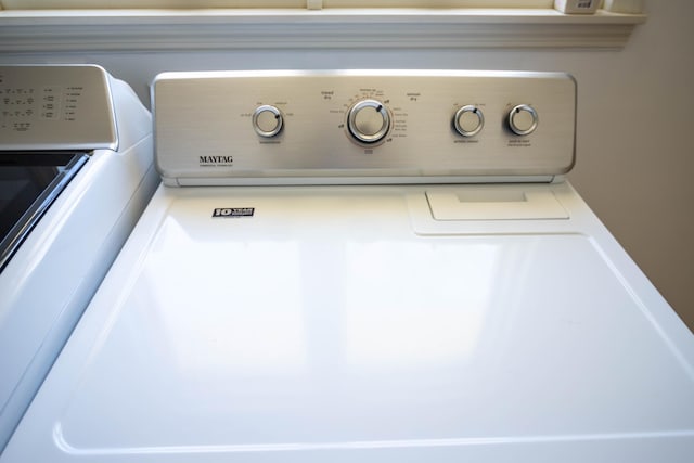 interior details featuring washer and clothes dryer