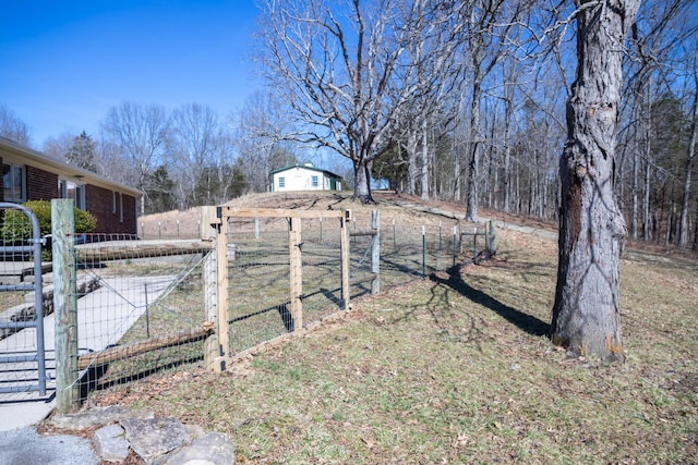 view of yard with a gate and fence