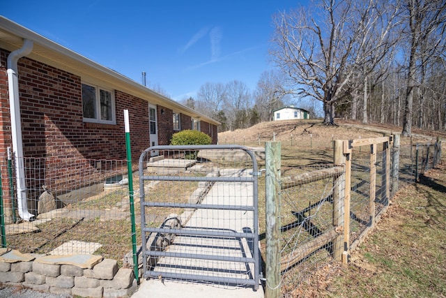 view of yard with a gate and fence