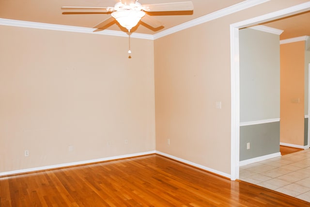 415 David Ln, Winchester, KY 40391 - spare room with wood finished floors, a ceiling fan, and ornamental molding
