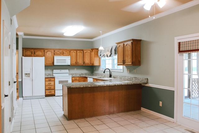 415 David Ln, Winchester, KY 40391 - kitchen featuring white appliances, a peninsula, brown cabinets, healthy amount of natural light, and crown molding