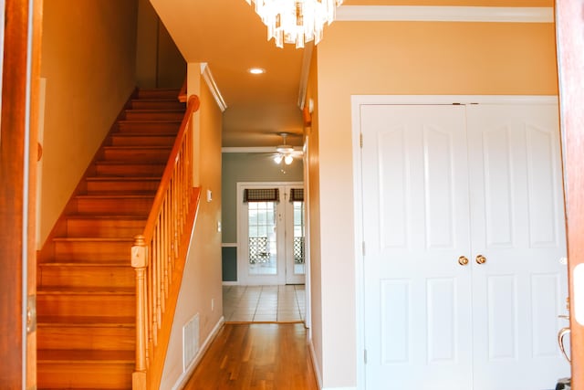 415 David Ln, Winchester, KY 40391 - stairs featuring crown molding, wood finished floors, recessed lighting, a chandelier, and a ceiling fan