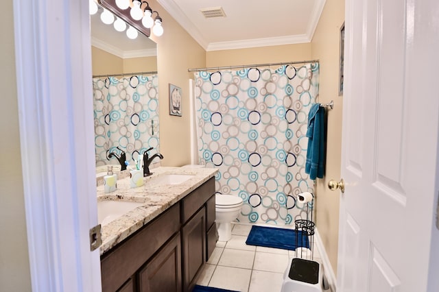 bathroom featuring a sink, visible vents, and crown molding