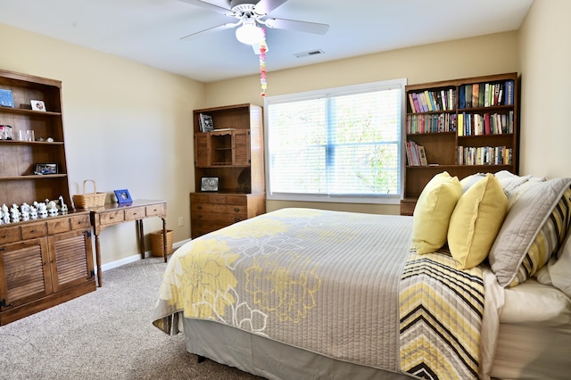 bedroom with carpet, visible vents, ceiling fan, and baseboards