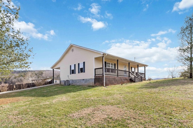 exterior space with a porch, cooling unit, crawl space, and a front lawn