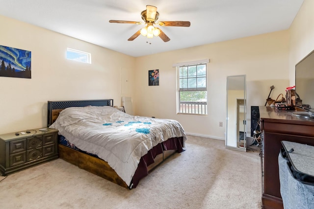 bedroom with carpet floors, ceiling fan, and baseboards